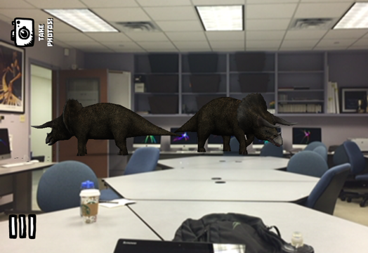 Phone screenshot image of computer generated dinosaurs walking over the desks of a classroom