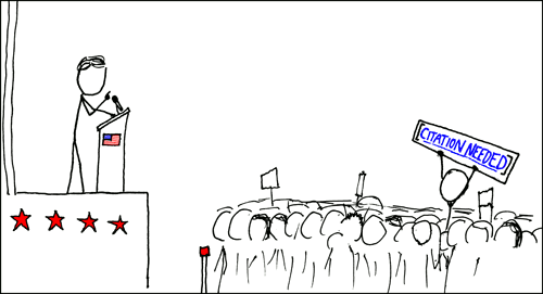 A cartoon stick-figure of someone giving a speech. In the middle of the crowd, one person's head is visible, and this stick figure is holding up a sign that reads citation needed.