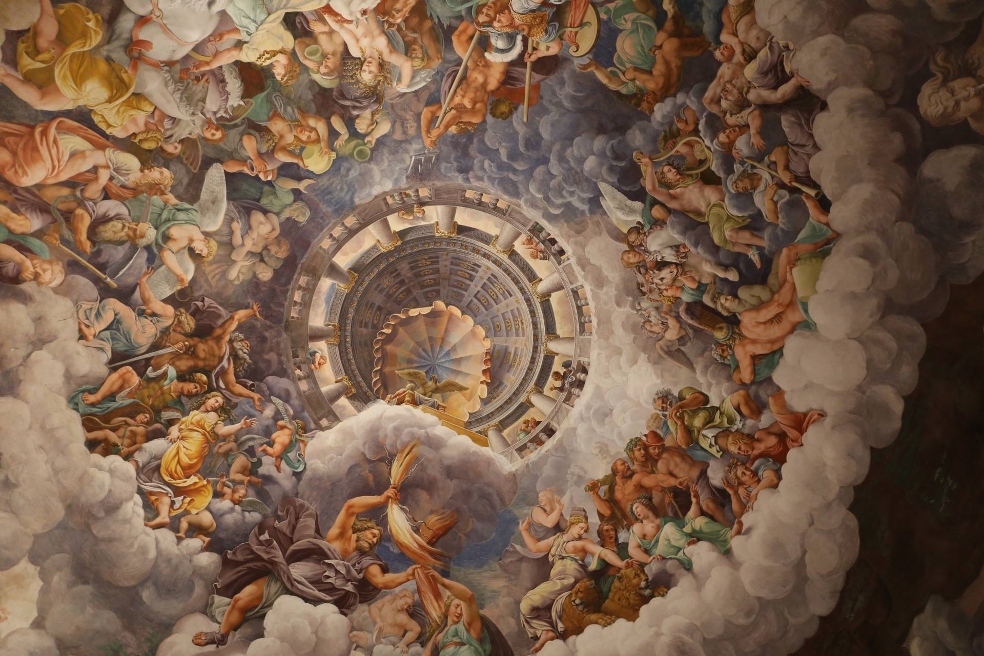 Photo of the domed ceiling of the Palazzo del Te in Italy, painted to tell the Greek legend of the giants' removal from Olympus.
