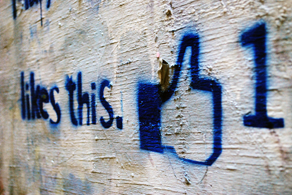 Image showing a graffiti version of the Facebook "Like" Button, with one like