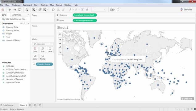 On the left, there are two tabs called "Dimensions" and "Measures." After dragging and dropping the "Country Code" under "Measure" into the middle column, the sheet becomes a geographic map of the world. The map here shows blue dots in various cities around the world, signifying the levels of CO2.